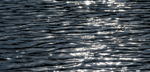 Reflection in the water at dusk. Sunset.