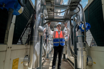 Engineers inspect gas and water pipes for power and cooling in industrial and building systems....
