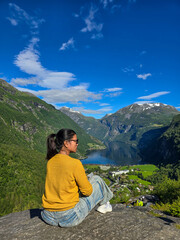 Naklejka premium Embracing Serenity in Norway's Majestic Fjord Landscape Under Clear Blue Skies