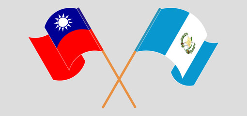 Crossed and waving flags of Taiwan and Republic of Guatemala