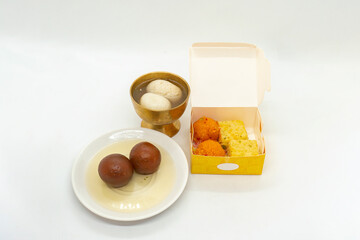 Collection of Indian Sweets Kalakand Burfi, Laddu, Motichur Laddoo, Gulab Jamun, Lalmohan, Rasbhari