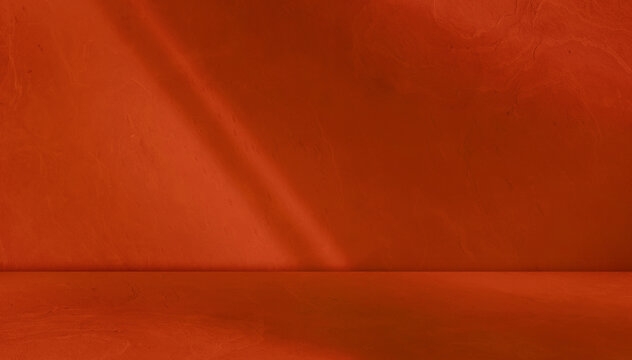 red background studio room with light beam from above for product display especially cosmetic or beauty products. floor and wall backdrop muslin design backdrop. stone surface texture podium.