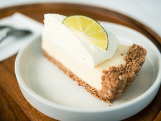 A piece of cake with lemon topping. Close up