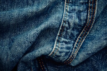 Close-Up of Denim Fabric Showcasing Texture and Stitching Details