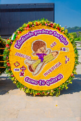 Fototapeta premium Medellin, Antioquia, Colombia. August 17, 2022. Silleteros parade, flower fair in the city