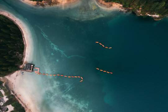 Aerial view of lake with docks and boats
