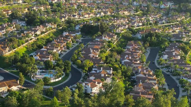 The stunning aerial view beautifully highlights the serene and sophisticated neighborhood of Calabasas in Los Angeles, California, characterized by luxury homes and vibrant green scenery