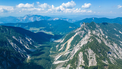 A stunning view of Slemenova Špica, showcasing a picturesque hiking trail in the Slovenian Alps....