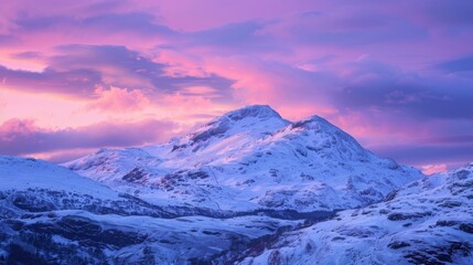 Stunning snowy mountain peak with purple twilight sky. The serene twilight adds a magical ambiance, highlighting the majestic snow-covered summit.