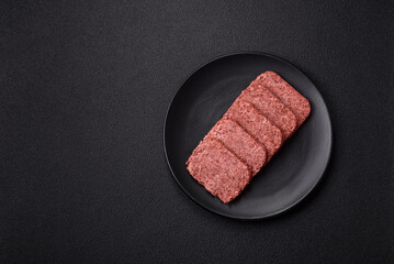 Delicious canned pink ham with salt, spices and herbs