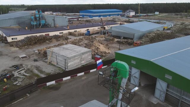 frash of Russia develops from the wind over an industrial building