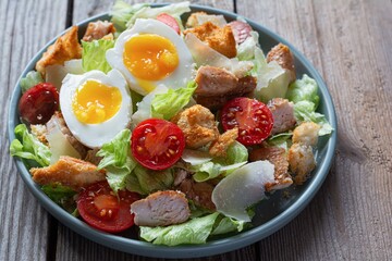 Fresh Caesar salad with chicken. Healthy breakfast, brunch.  
