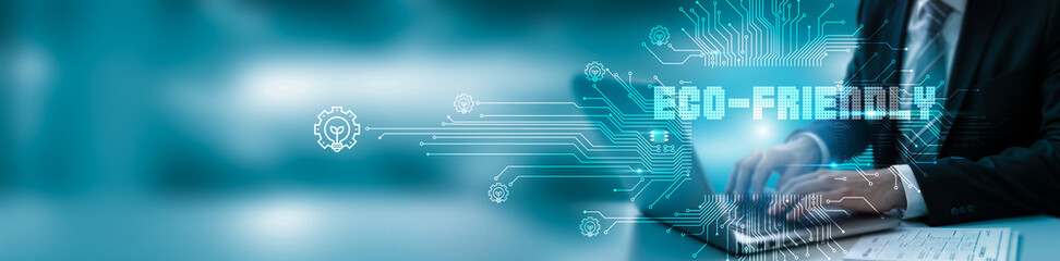 Hand touching a laptop with an eco-friendly network connection, seamlessly integrating technology and futuristic solutions for a sustainable world.