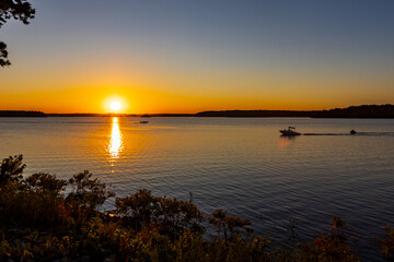Boating on Degray Lake at Sunset.