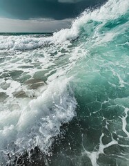 Fototapeta premium Abstraction of sea foam in the ocean. Turquoise light water.