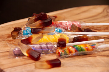 candy on a wooden plate