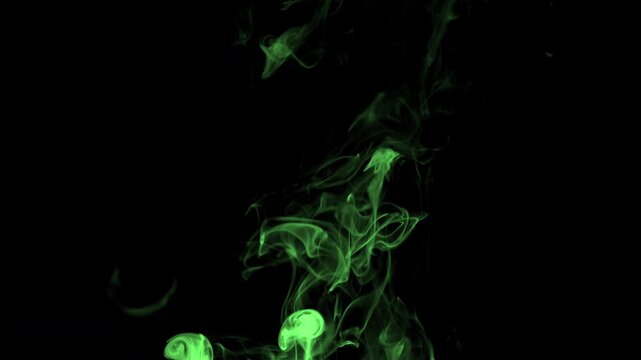 Real green smoke from incense on black background, smoke overlay in slow motion. Close up, ProRes 422, 10 bit