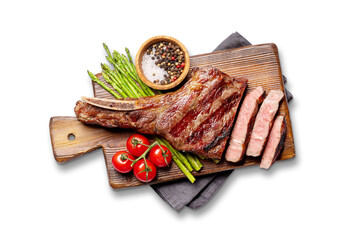Medium rare grilled Tomahawk beef steak with asparagus