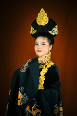 young asian women wearing makeup, wearing batik clothes and Indonesian cultural attributes