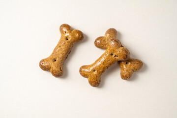 Pet food, bone shaped dog food or treat snack.
