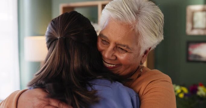 Happy woman, senior and patient with hug in elderly care for support, help or love at old age home. Medical caregiver, volunteer or nurse with client or smile for embrace, trust or thank you at house