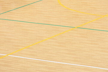 Wooden floor basketball, badminton, futsal, handball, volleyball, football, soccer court. Wooden floor of sports hall with marking lines on wooden floor indoor, gym court
