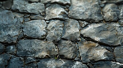 Obraz premium Grungy stone background with textured cracks and natural wear