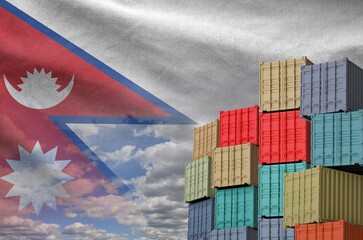 Nepal flag and big stack of shipping cargo containers in docks with sky background close up