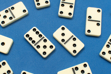 Dominoes bones on blue background