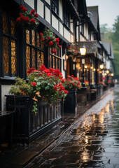Fototapeta premium traditional pub on a rainy street of an English city, architecture, house, windows, building, England, Great Britain, Scotland, bar, hotel, lights, evening, night, paving stones, European town, puddle