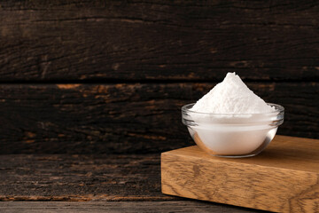 Baking soda - Crystalline solid compound in the bowl.