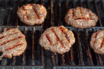 Selective focus background image of burgers grillin summer activitie