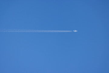 airplane on blue sky background