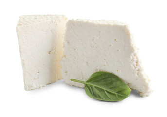 Tasty ricotta (cream cheese) and basil isolated on white