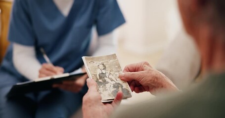 Elderly hands, support and therapy in nursing home for mental health, memory or healthcare. Counseling, consultation or psychology for talking with picture for senior person, empathy and grief advice