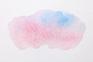 Colorful watercolor painting on white paper, top view