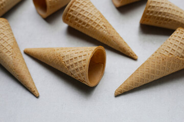 Waffle cones on grey background