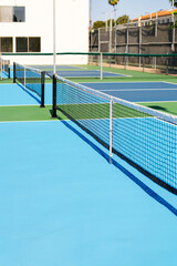 empty pickleball nets and courts