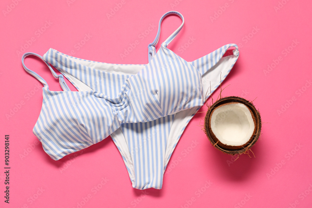 Canvas Prints Striped swimsuit and coconut on pink background, flat lay