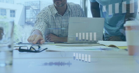 Image of financial data processing over diverse business people in office