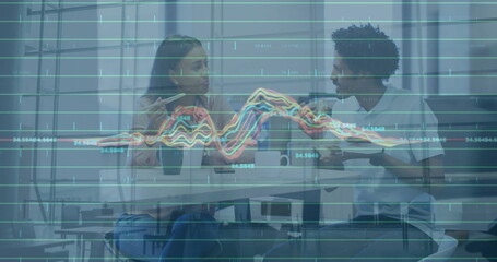 Image of financial data processing over diverse colleagues discussing work in office