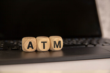 Denia, Alicante - Spain - 12-22-2023: Person using an ATM