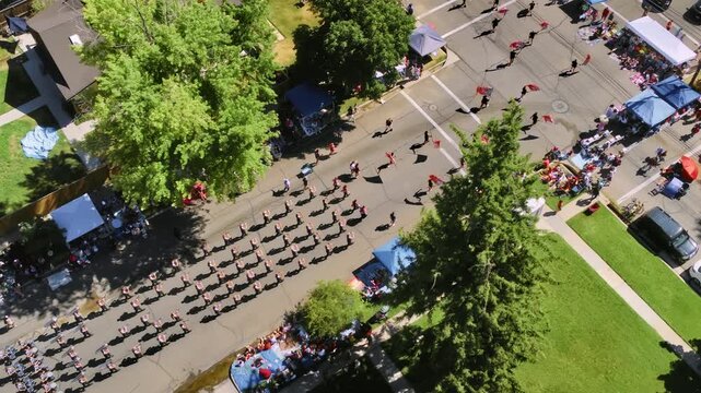 Amazing parade marching through Provo street - drone shot