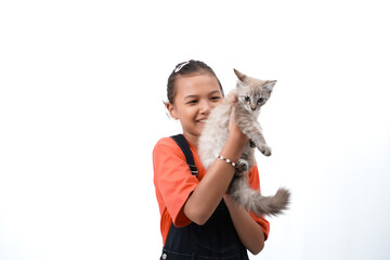 Asian girl holding a cute, adorable and funny kitten. Isolated on white background. International cat day concept.
