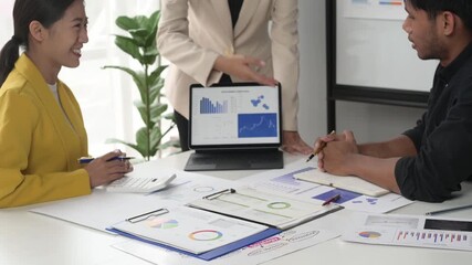 Financial analysis by diverse business team in office meeting - Powered by Adobe