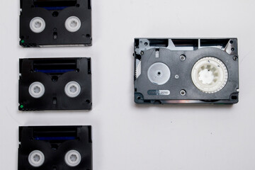 Fototapeta premium Minidv video tape vs vhs c video tape