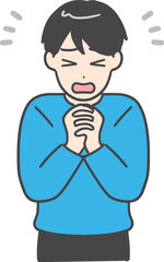 両手を組んでお願いしている私服の若い男性(上半身・正面)