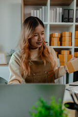 the owner has the checklist with her in the workplace, she is doing well preparation about all of the package before deliver to customers, checking information of customer for accuracy