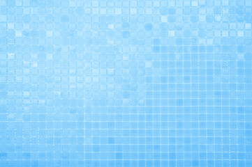 Abstract blue background with some smooth lines in it and some reflections of tile wall.