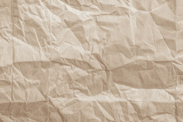 Fototapeta premium Crumpled brown paper texture. Abstract background and texture for design.